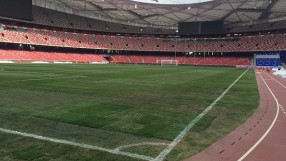 Състоянието на тревата на стадиона в Пекин (ГАЛЕРИЯ)