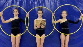 Съчетание с обръчи и книги - един по-различен турнир по художествена гимнастика