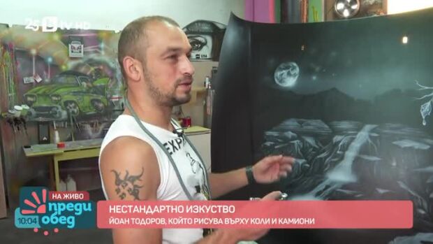 Снимка: Йоан Тодоров, който рисува върху коли и камиони