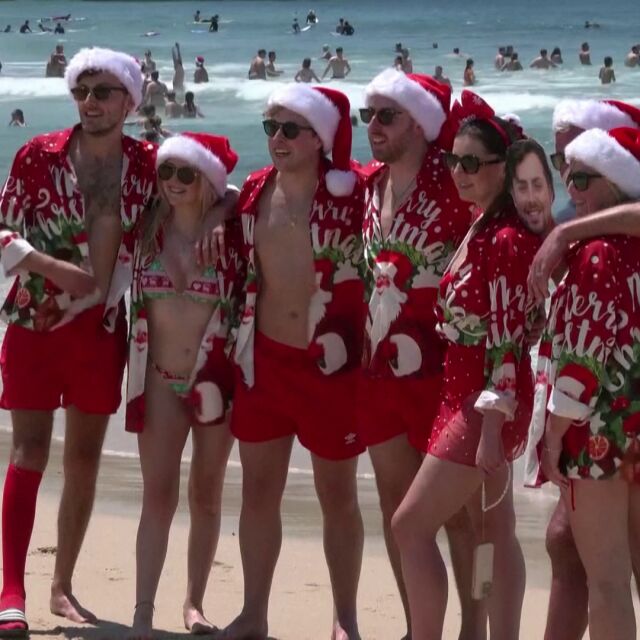 Посрещнаха Дядо Коледа на сърф и по бански във Флорида и Сидни (ВИДЕО)