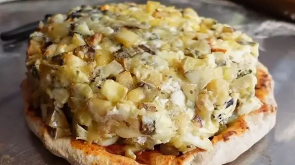 Направиха пица с 1001 вида сиренe от цял свят