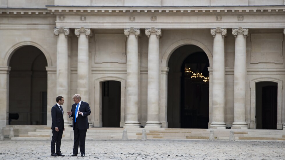 Тръмп е в Париж, но кой командва парада